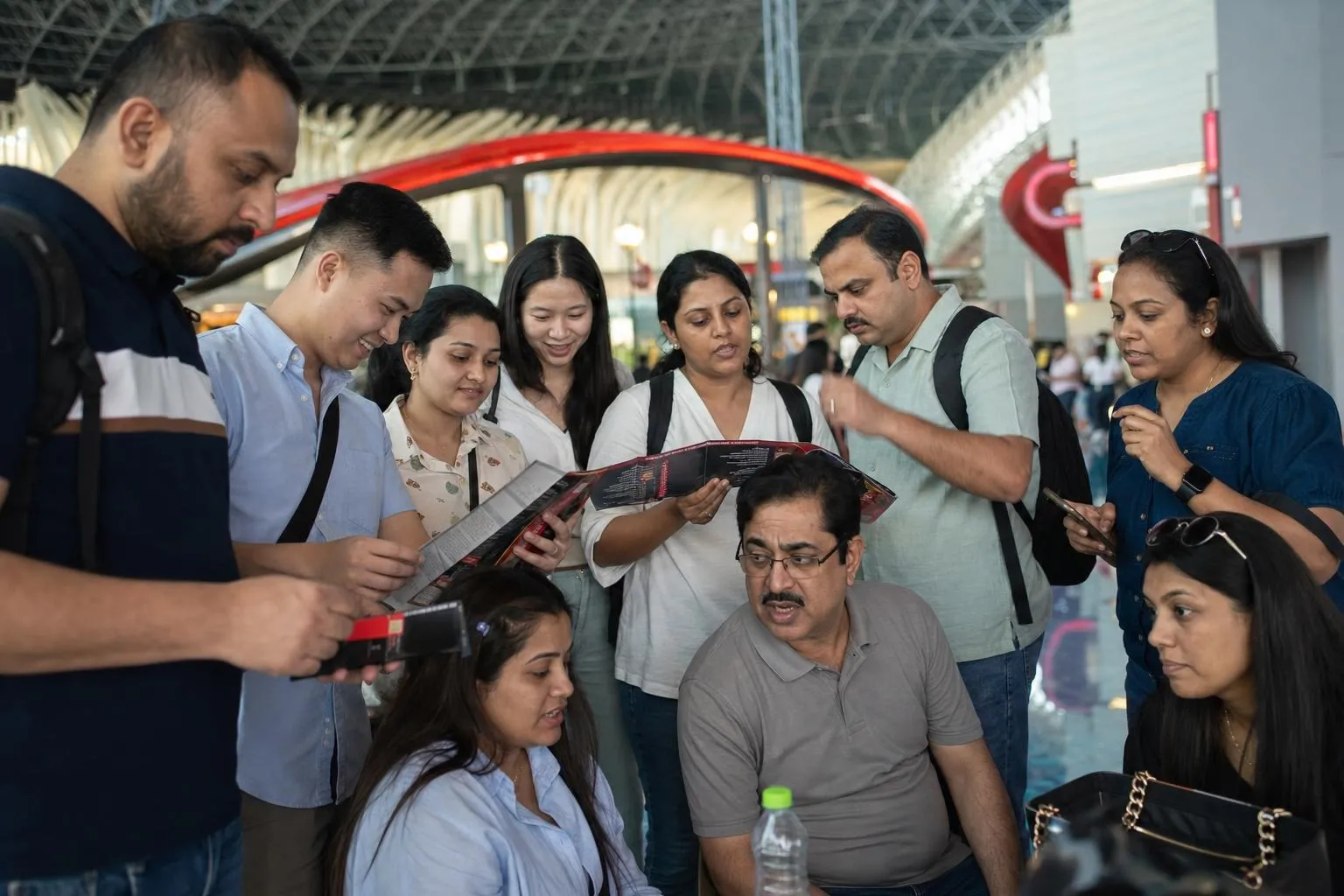 A team mid-programme on Capital Thrills — Abu Dhabi, Yas Island: Ferrari World or Warner Bros. World.