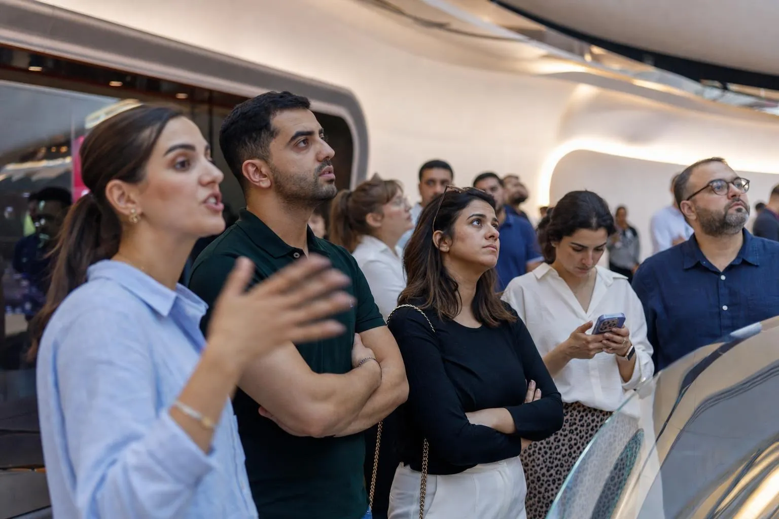 A team mid-programme on Night City — Dubai, Museum of the Future, Sky Views Observatory, Downtown.